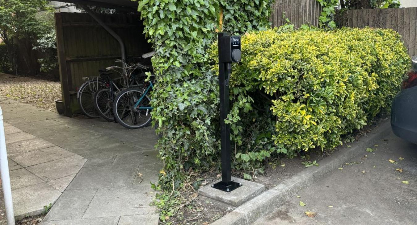 EV charging point located in parking space block of flats